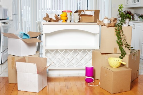 Organised packing boxes ready for a move in Queens Park