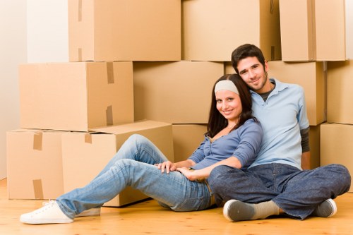 Careful loading of office furniture in a local Queens Park move