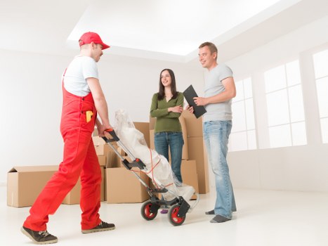 Careful wrapping and organising belongings during a packing service
