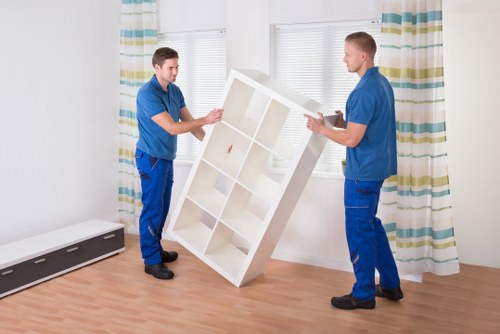 Prepared moving boxes and household items for a Queens Park home relocation