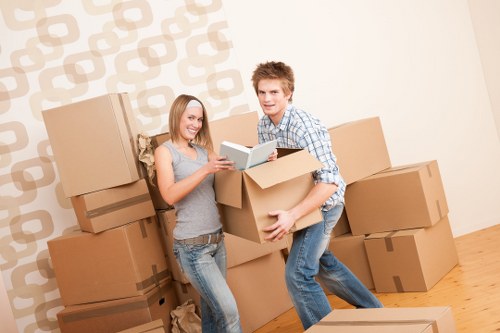 Careful furniture handling during a flat move in Queens Park